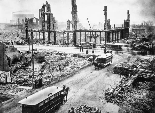 Black and white photo of the aftermath of the Great Chicago fire with burned buildings.